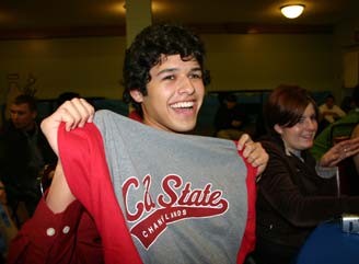 Student holding CSUCI jersey